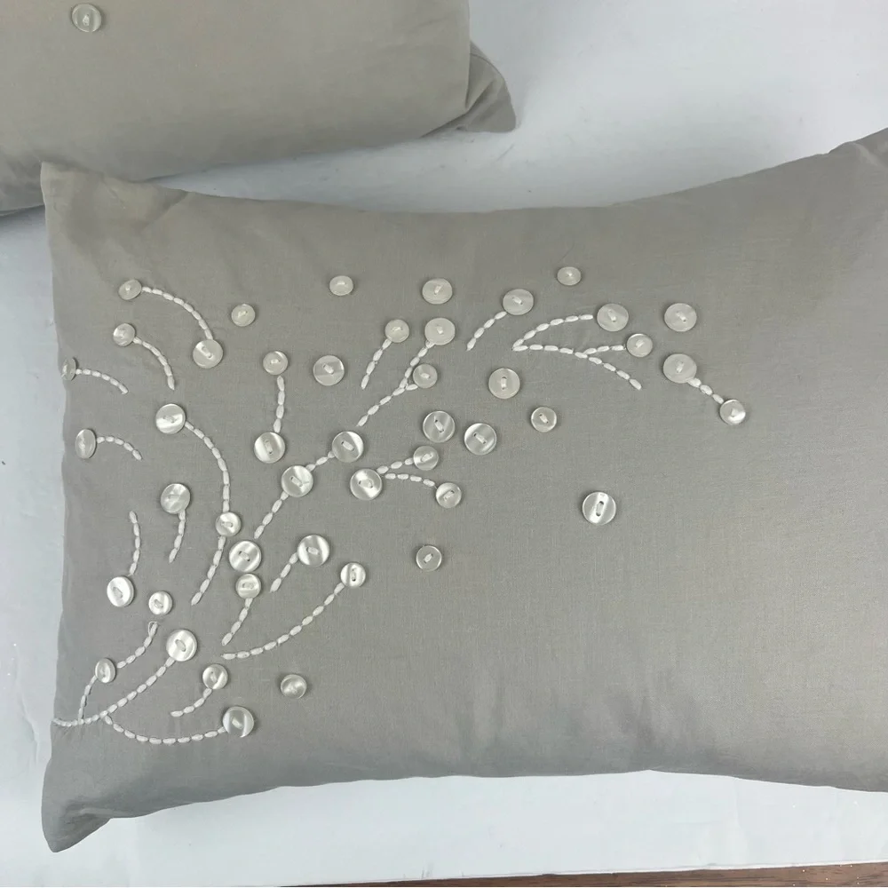 Pair of Barbara Berry grey accent pillows with button & embroidered accents